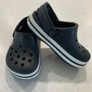Black toddler Crocs.